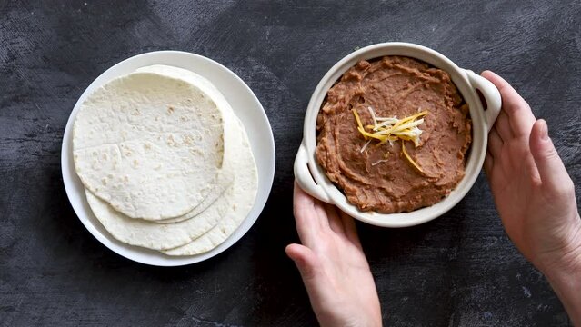 Serving a bowl of Refried Beans