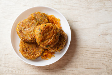 Perkedel Kentang is Potato croquette of ground meat and boiled potatoes or other starch, which then mash the potatoes together with garlic, salt, and pepper.