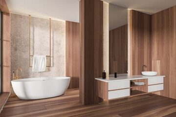 Fototapeta na wymiar Stylish bathroom interior with sink and mirror, bathtub with towel