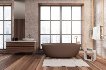 Front view on bright bathroom interior with bathtub, panoramic window