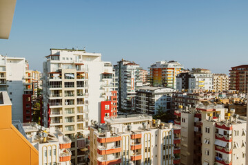 Fototapeta na wymiar City modern high-rise apartment buildings on sky background
