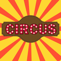 The inscription circus on a wooden plaque with glowing bulbs