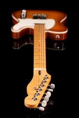 Fototapeta na wymiar electric guitar, guitar neck, on a black background, custom