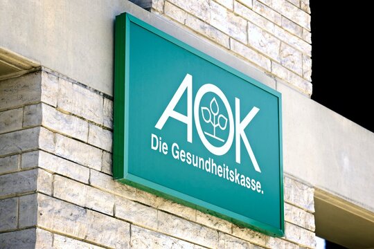 Neu-Ulm, Germany - July, 20, 2022: logo and inscription of AOK, a branch of a german health insurance.
