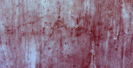 Cracked red background, spooky bloody wall background. white wall with blood splatter for horror and creepy background.