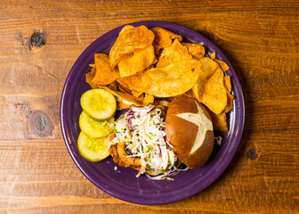 Pulled pork sandwich with fresh cut fries