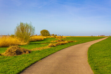 Wadden sea tidelands coast walking path landscape Lower Saxony Germany.