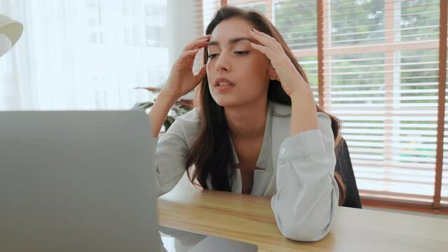woman tired of work and not inspiration lazy apathetic look at laptop
