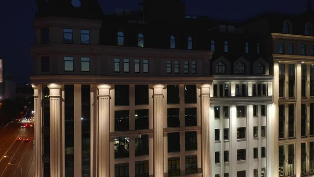 Illuminated business center office building at night. Astarta business center in Kyiv.
