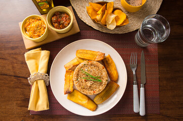 Fried vegetable rice with fried plantains peru peruvian gourmet restaurant popular comfort food