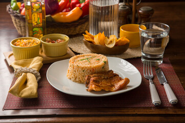 Fried Vegetable rice with fried pork chop peru peruvian gourmet restaurant popular comfort food