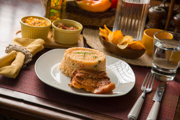 Fried Vegetable rice with fried pork chop peru peruvian gourmet restaurant popular comfort food