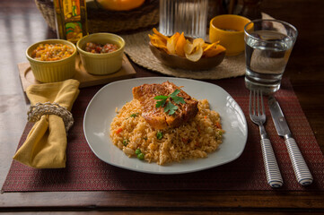 Fried Vegetable rice with fried pork chop peru peruvian gourmet restaurant popular comfort food