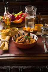 Noodles bolognese with chicken wings peru peruvian gourmet restaurant popular comfort food