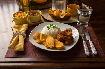 Pork chop with sweet potatoes peru peruvian gourmet restaurant popular comfort food