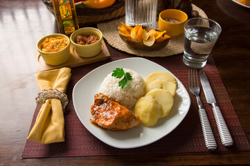 Roasted chicken with boiled potatoes Peruvian gourmet restaurant food