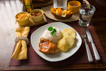 Roasted chicken with boiled potatoes Peruvian gourmet restaurant food