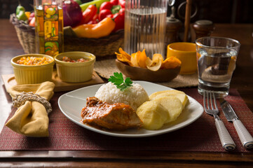 Roasted chicken with boiled potatoes Peruvian gourmet restaurant food