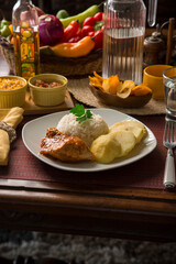 Roasted chicken with boiled potatoes Peruvian gourmet restaurant food