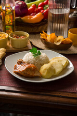 Roasted chicken with boiled potatoes Peruvian gourmet restaurant food