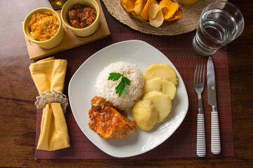 Roasted chicken with boiled potatoes Peruvian gourmet restaurant food