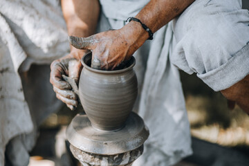 clay pot making on the potter's wheel 