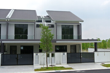 SELANGOR, MALAYSIA - JUNE 18, 2022: New double-story terrace house under construction in Malaysia....