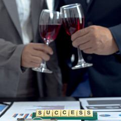 Both businessmen drink White to celebrate their financial and business success, Congratulate and celebrate concept.