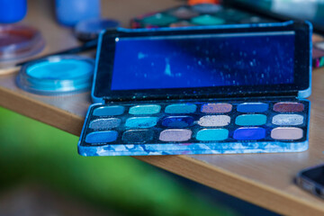 Makeup box. Different colors of mascara for women's make-up.