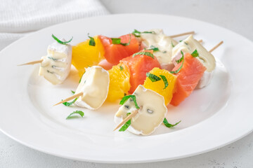 Skewers with cheese and trout