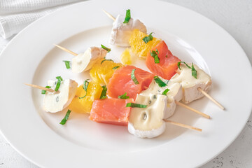 Skewers with cheese and trout