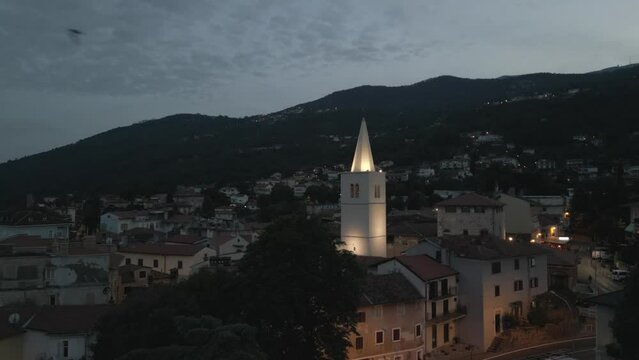 Aerial shot of St. George's Church and the town of Lovran at dusk, Lovran, Eastern Istria