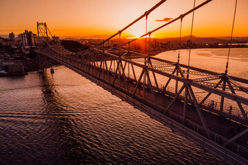 Cable stayed bridge with sunset sky in Florianopolis, Brazil. Aerial view