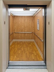An empty elevator with the door open © Aaron Perkinson