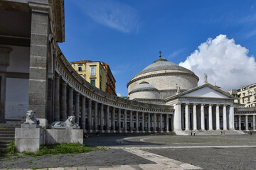 View of the square called Plebiscito with the facade of the cathedral in Naples, the capital of the Campania region, Italy.