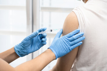 A man get covid 19 vaccine at hospital
