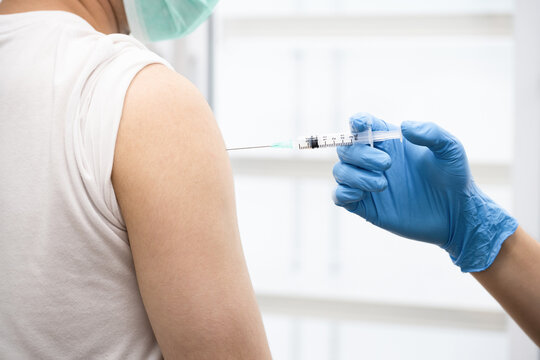 A man get covid 19 vaccine at hospital
