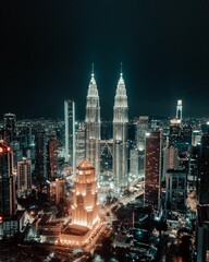 Naklejka premium Vertical shot of Kuala Lumpur skyline at night