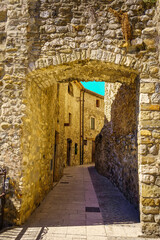 Stone arch in an alley of the medieval town of Besalu in the province of Gerona, Catalonia.