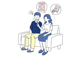 出産準備の話をする女性と、戸惑う夫