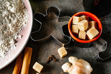 Gingerbread ingredients and accessories for making ginger dough.