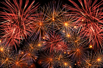 Abstract background, bright explosions fireworks black background.