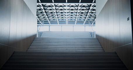 Fototapeta na wymiar Empty school staircase interior. Light shining through glass building window .