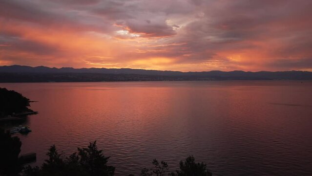 Kvarner Bay across to Rijeka from Lovran and red sky after sunset, Kvarner Bay