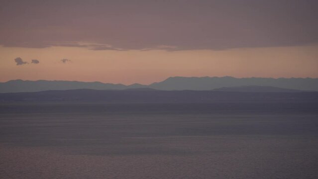 Kvarner Bay across to Krk Island from Lovran and red sky after sunset, Kvarner Bay