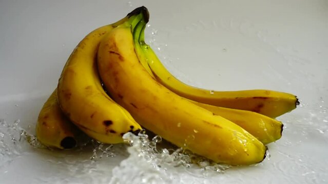 Washing of bananas. Slow motion.