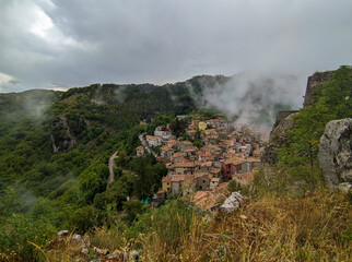 Fototapeta na wymiar View of Cervara di Roma with fog, beautiful village in Rome Province, Lazio, Italy.