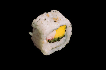 brazilian japanese food isolated on black background vegetable sushi.
