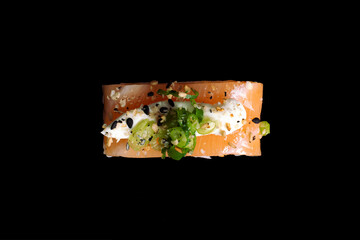 brazilian japanese food isolated on black background brazilian rice and salmon sushi.