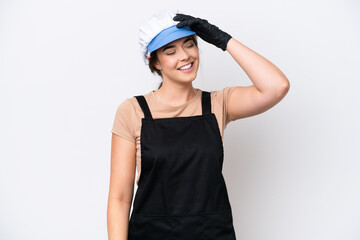 Fishmonger brazilian woman wearing an apron isolated on white background smiling a lot